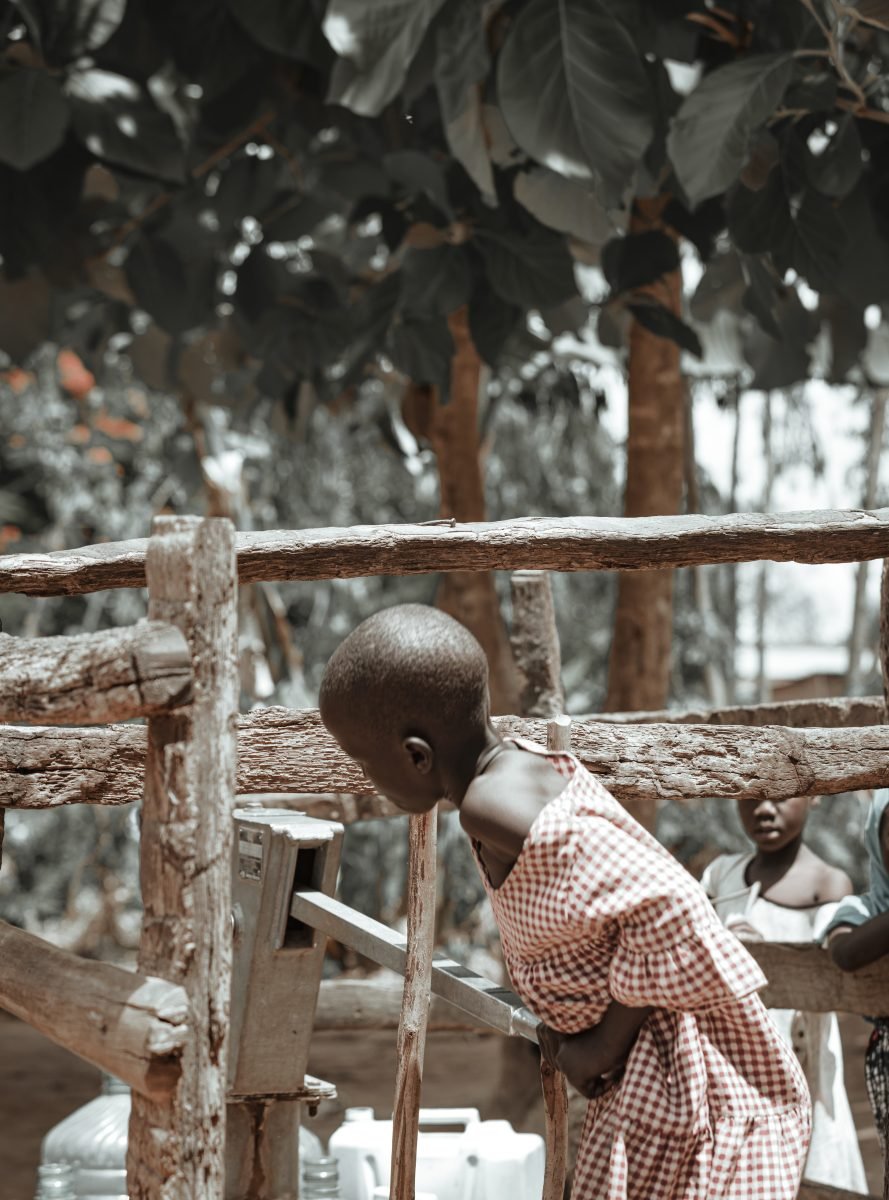A girl at a water point in Yumbe