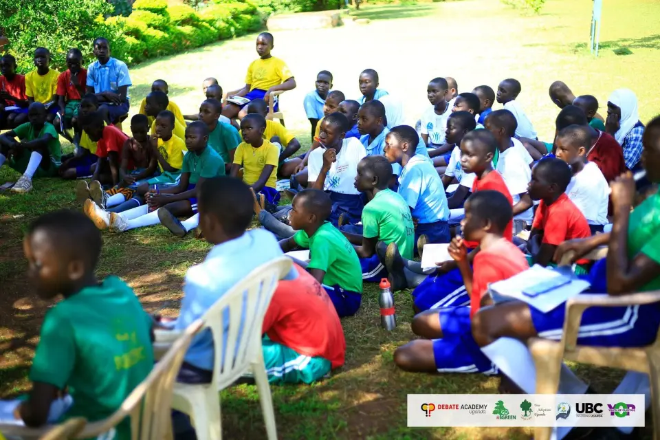 Pupils gathered outdoors for a school session