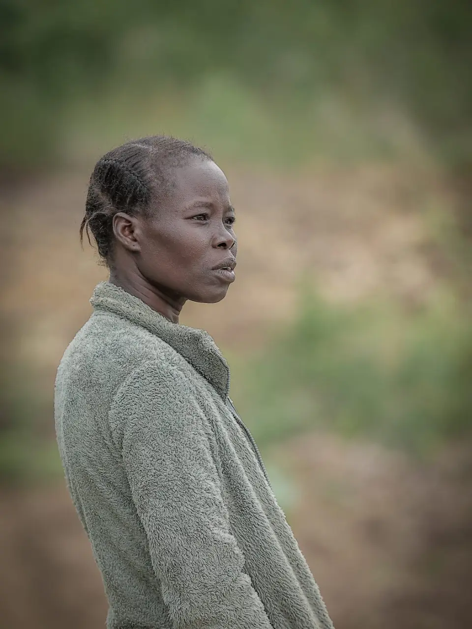 A woman standing in a field