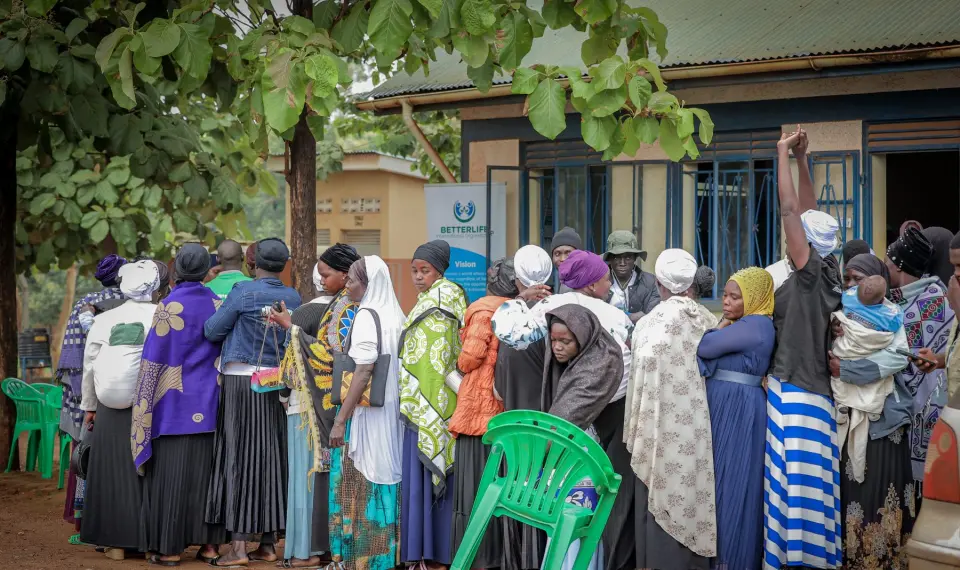 A crowd of women gathered outside a building on a programme day in Yumbe