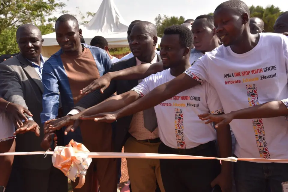 Cutting the ribbon at the launch of the Apala One Stop Youth Centre in Alebtong